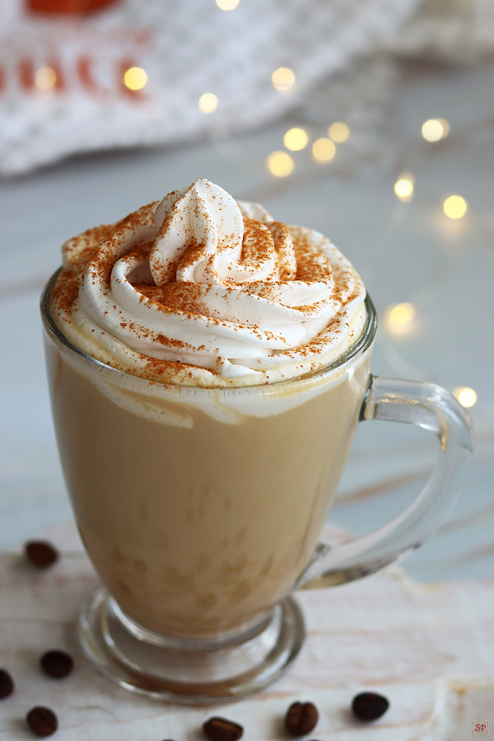 pumpkin latte served with whipping cream