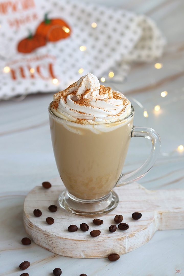 pumpkin latte served with whipping cream