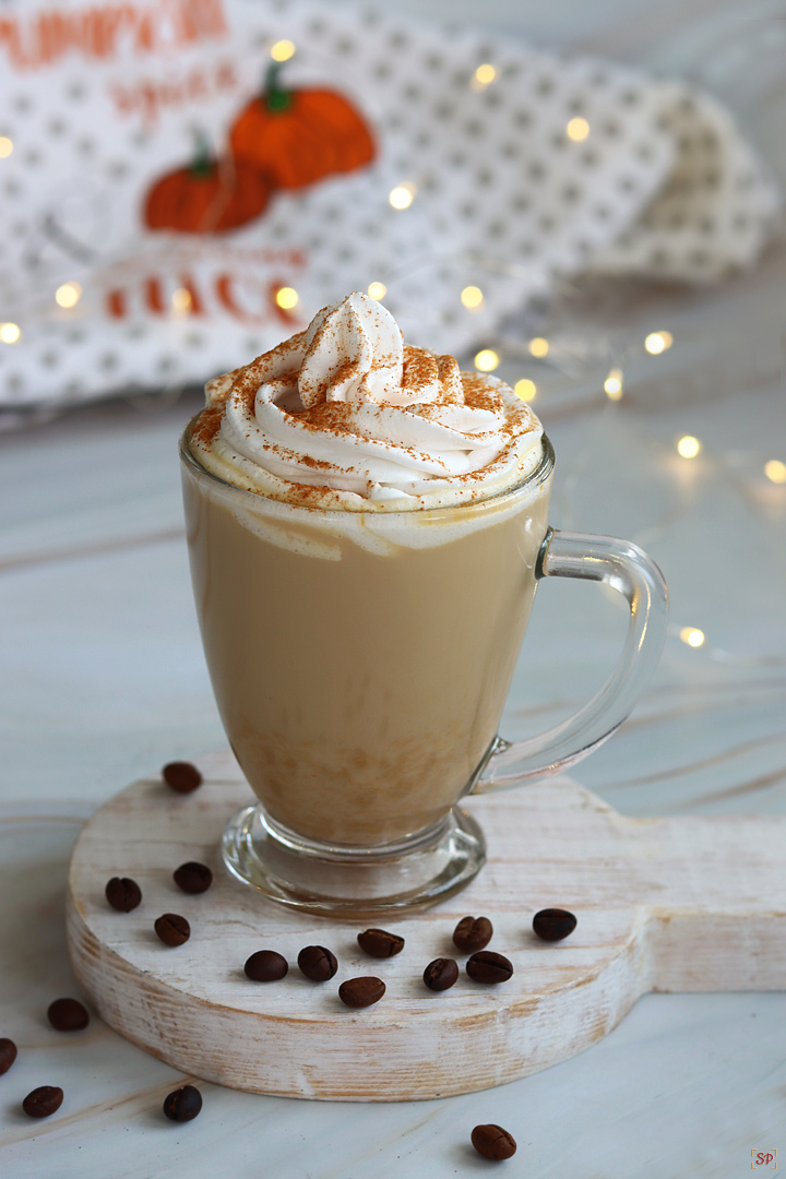 pumpkin latte served with whipping cream