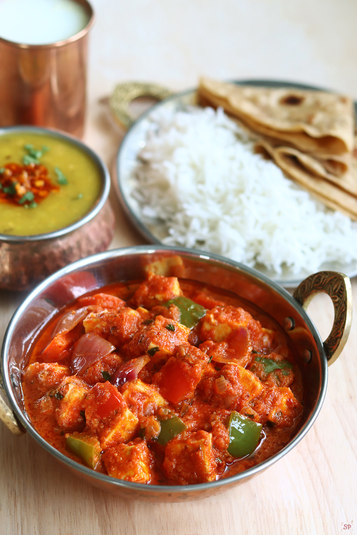 kadai paneer served with rice, roti, dal